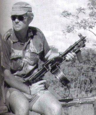 Name:  John Fletcher of the Selous Scouts with one of armourer Phil Morgan's famous chopped RPDs.jpg
Views: 274
Size:  23.2 KB